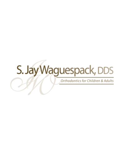 Dr. Waguespack Orthodontics logo.